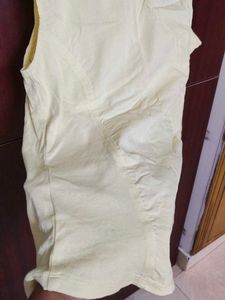 Yellow sleeveless shirt for women
