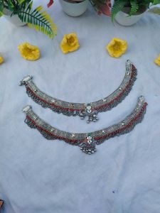 Intricate Anklets with Red Beads