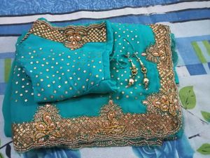 Stunning Teal Embellished Saree