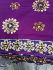 Elegant Purple Saree with Embellishments