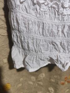 white smocked ruffle crop top