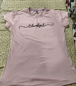 a pink top