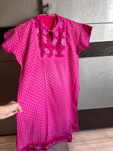 Vibrant Pink Kurti with Floral Accent