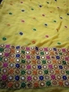 Vibrant Yellow cloth with Mirror Work