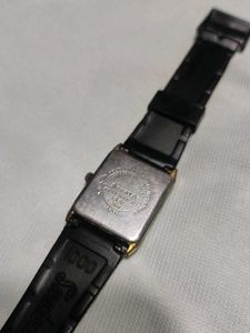 Black Strap Golden dial Watch in non working