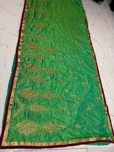 Vibrant Green Silk Saree with Gold Embroidery