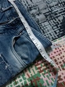 Distressed Blue Denim Jeans