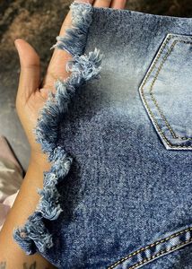 Distressed Denim Shorts