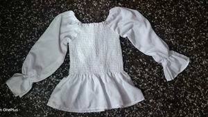 White Smocked Peplum Top