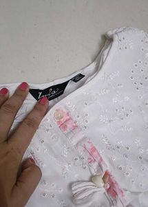 Elegant White Kurti with Subtle Pink Accents