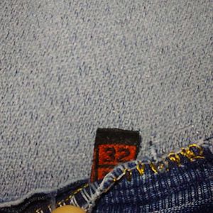 Distressed Light Wash Denim Jeans