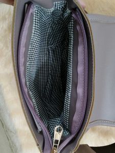 Stylish lavender crossbody bag with coin purse
