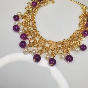 four layer Gold Chain Bracelet with Purple Beads