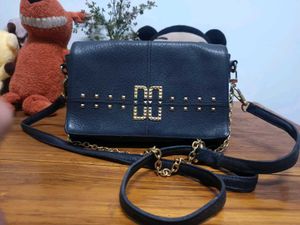 Authentic Daks Dark navy blue Leather sling bag