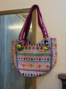 Embroidered Hobo Bag with Tassels