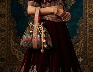 Luxury Brocade Potli Bag with Stone Jhumka Latkans