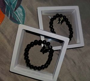Set of Black Beaded Bracelets with Charms