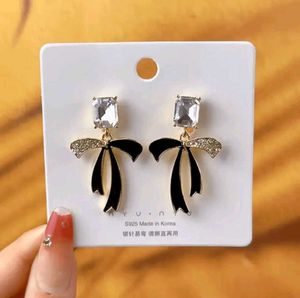 Elegant Black Bow Crystal Earrings