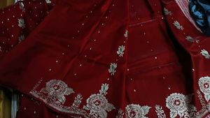Exquisite Red Silk Saree with Floral Embroidery