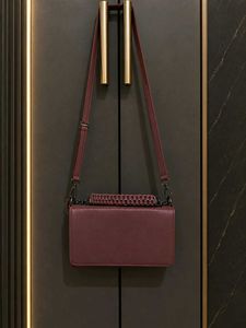 brown sling bag