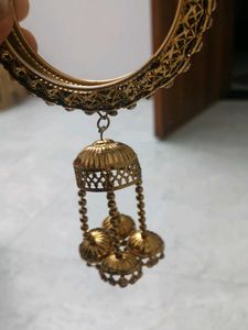 Elegant Gold Tone Bangle with Tassel