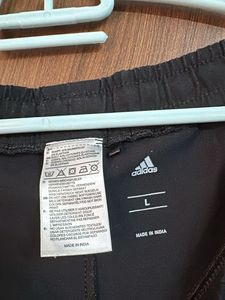Adidas Black Track Pants with Blue Stripes