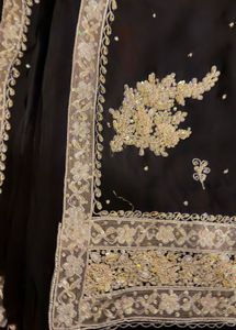 Elegant Black Saree with Intricate Embellishments