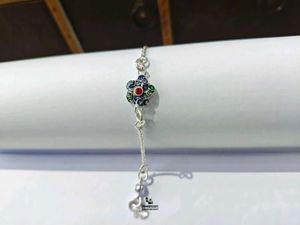 Pure Silver Rakhi with Flower Charm