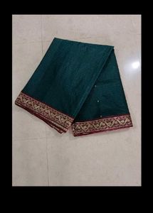 Elegant Teal Saree with Gold Border