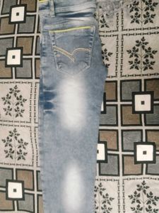 Stylish Blue Denim Jeans with Yellow Accent