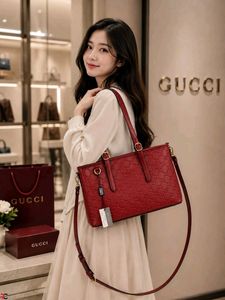 GUCCI GG EMBLEM MEDIUM CANVAS TOTE BAG*