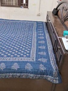 Blue Patterned Quilt Wait 1.850