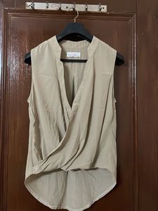 Elegant Sleeveless Drape Top