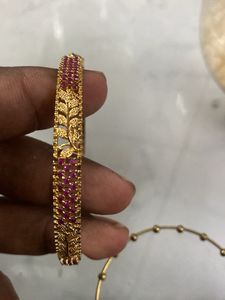 Elegant Gold Bangles with Red Stones