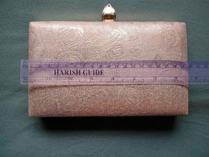 Elegant Rose Embossed Rosegold Clutch Bag