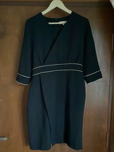 Elegant Black Wrap Dress with White Trim