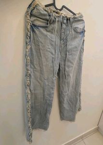 Distressed Denim Jeans with Fringe Detail