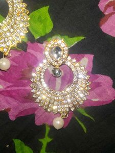 Earings And Teeka.