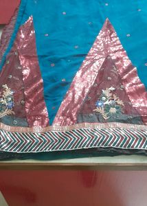 Party Wear Saree.Belive Me Its Too Preety, I Dont Wear Sarees So M Selling.Beautiful Sequence Pattern.colour Is Dark Green ,not Blue