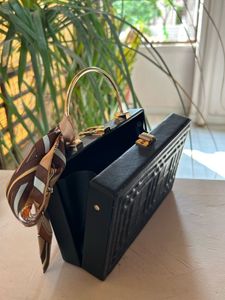 Structured Leather Black Sling Bagwith Golden Stra