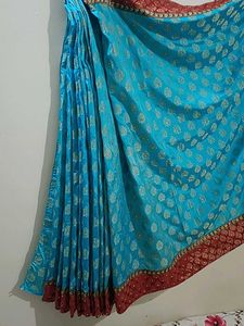 Banarasi SkyBlue Maroon And Gold With Stone Saree