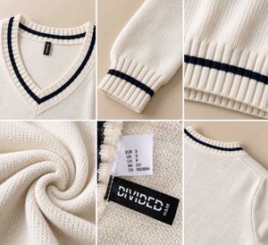 IVORY &amp; BLACK STRIPED CROPPED V-NECK SWEATER