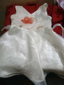 Adorable Girls' Cream Dress with Floral Accent