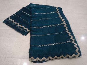 Elegant Teal Saree with Silver Border