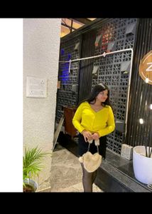 Vibrant Yellow Twist Front Long Sleeve Top with bl