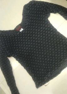 Black textured long sleeve top