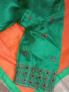 Vibrant Orange Saree with Embellished Blouse