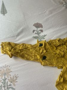 Yellow Ruffled top  with Floral Embroidery