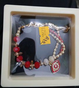 Elegant Beaded Bracelet with Charm