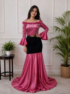 Pink elegant off shoulder gown.